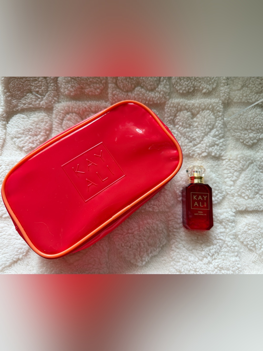 Kayali Red Cosmetic Pouch with travel size Kayali Eden